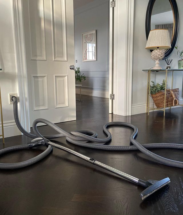 Beam Central Vacuum hose on hallway floor