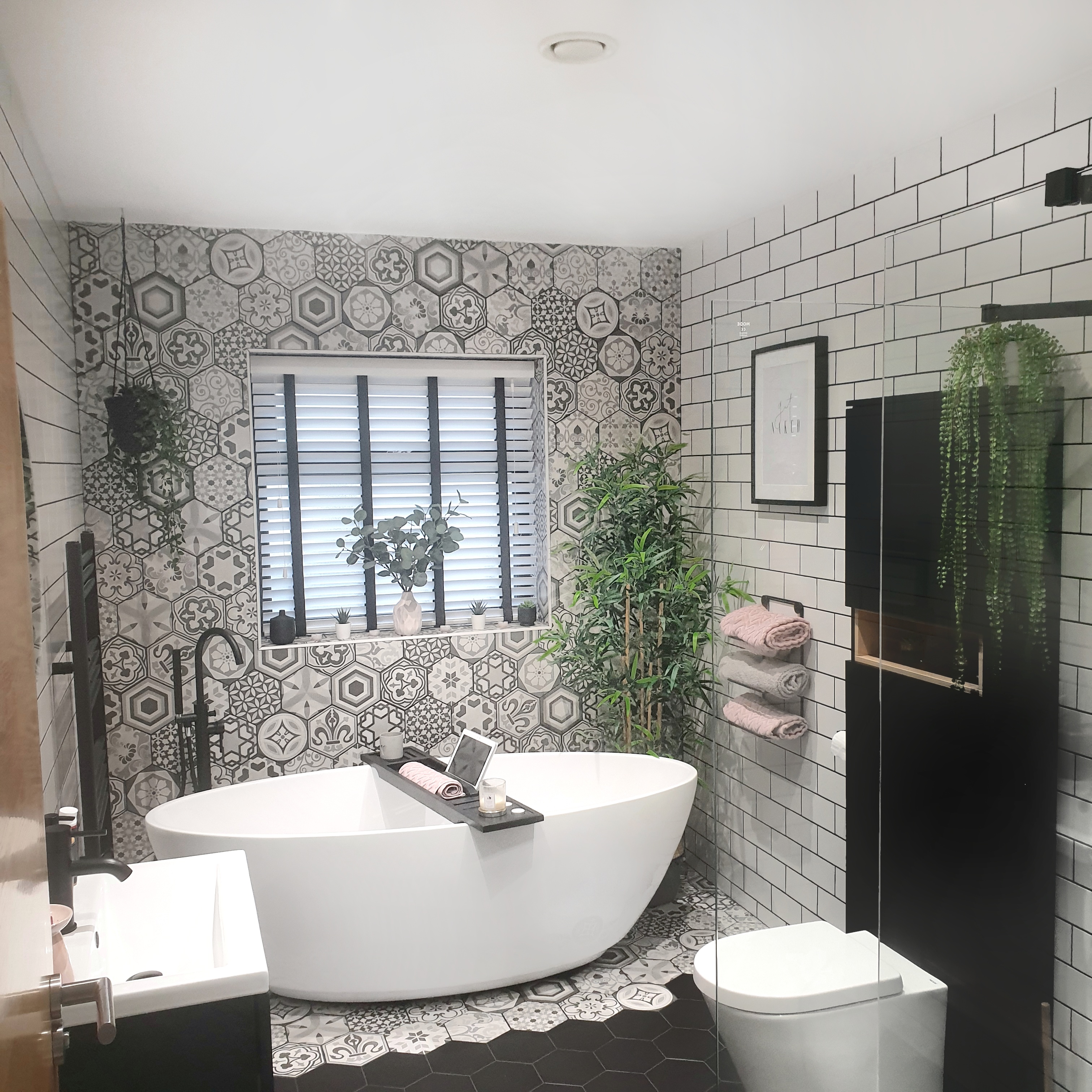 grey, black and white bathroom with Beam ventilation extraction valve on ceiling