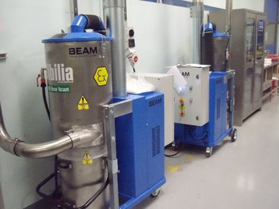 Beam dust extraction units in packaging facility