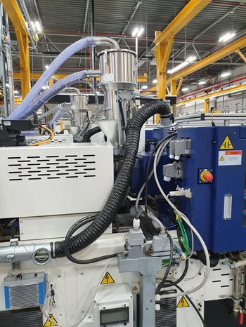 Dust and Fume Extraction arm attached to plastic cutting machine