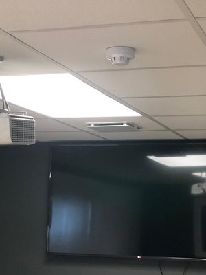 Beam HERU Supply Air Unit ceiling valve in conference room