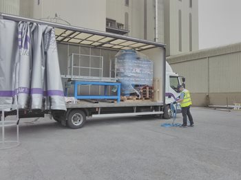 Beam lorry delivering dust fume extraction system