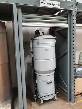 Beam Industrial central vacuum unit in storeroom