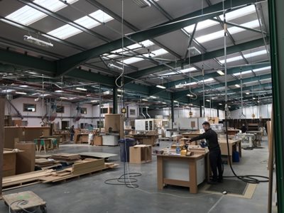 Specialist Joinery workshop with Beam vacuum in use at workstation