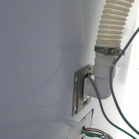 Beam Commercial Vacuum connected to wall inlet